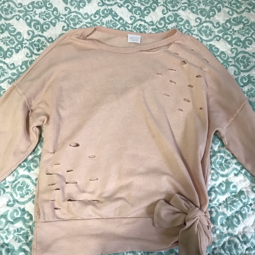 Sweatshirt with cutouts and a tie